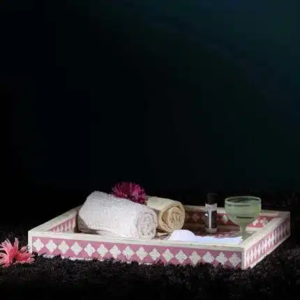 Decorative Bone inlay tray with intricate floral design and bathroom towels
