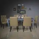 Front view of Elegance Mother of Pearl Dining Table showcasing intricate inlay design.